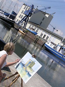 04_22780 - Aquarellkuenstlerin am Lotsehafen. 